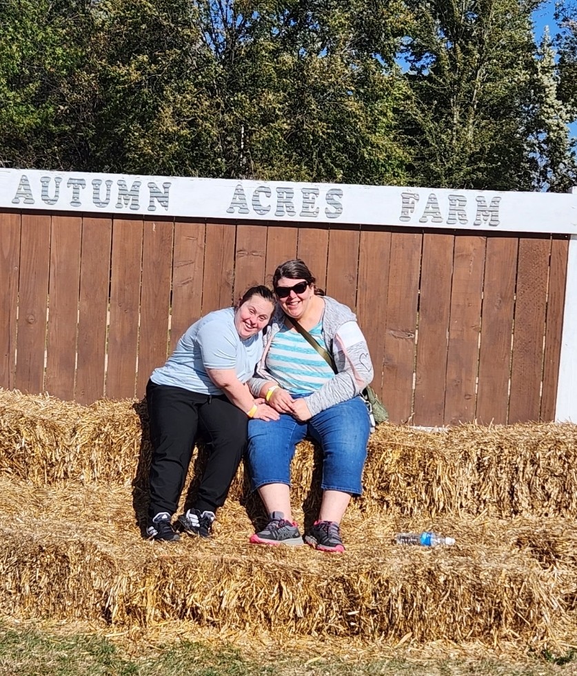 Alee Services participants enjoying an outdoor community event together.