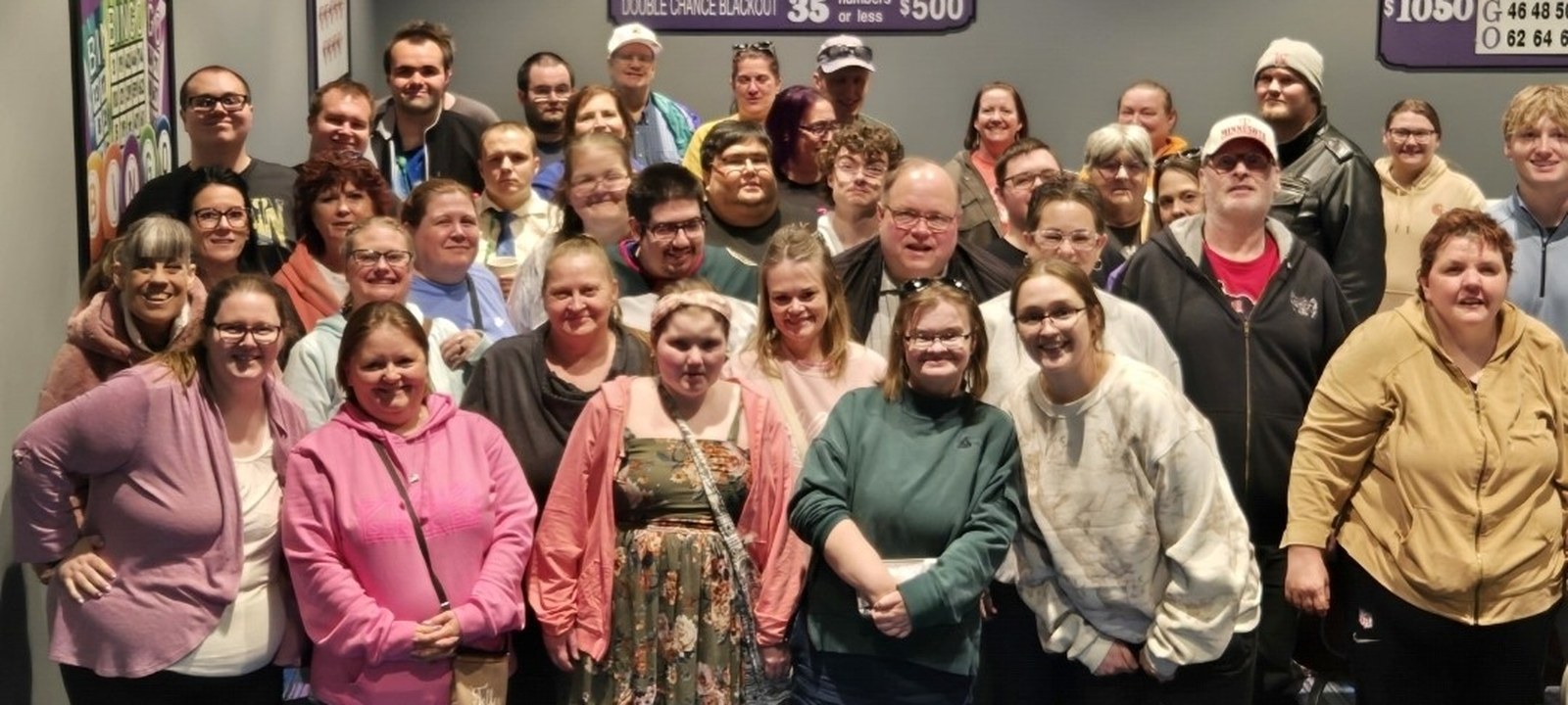 Alee Services team and community members together.